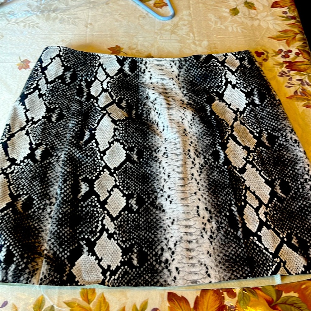 Leather look snake skin skirt. XL. Never worn